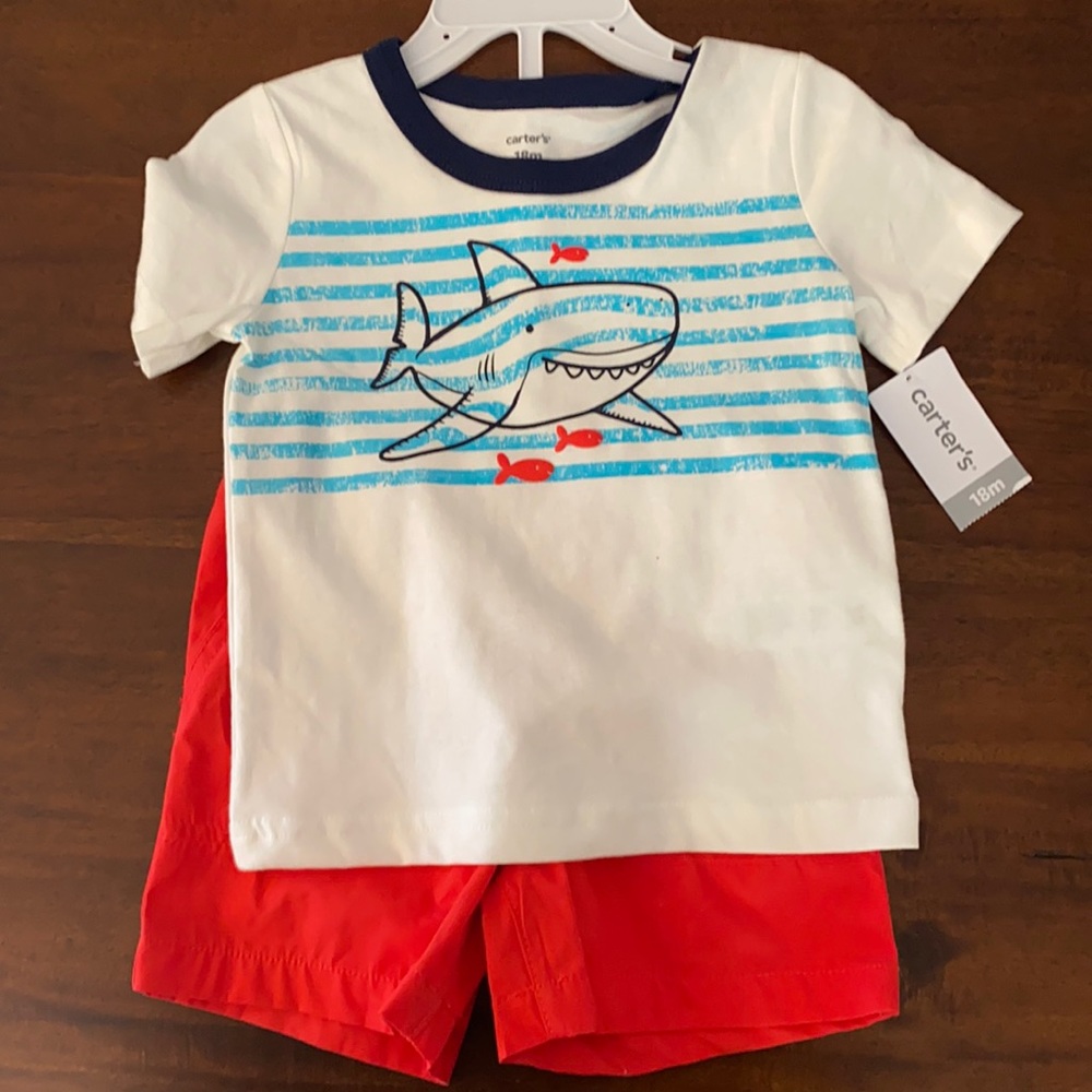 Shark shirt and red shorts